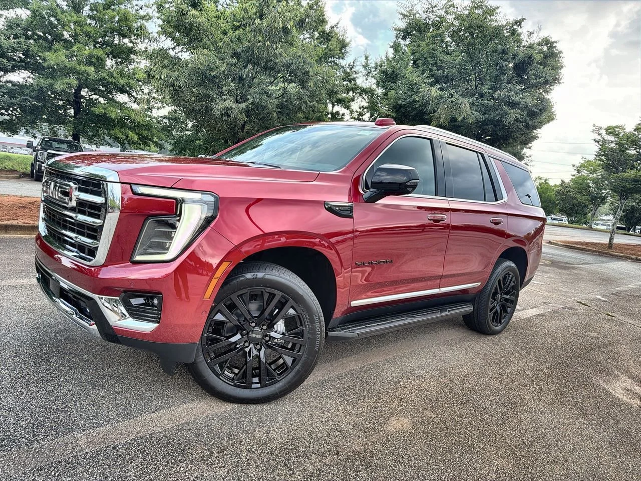 New 2026 Volcanic Red Tintcoat GMC Elevation image 1