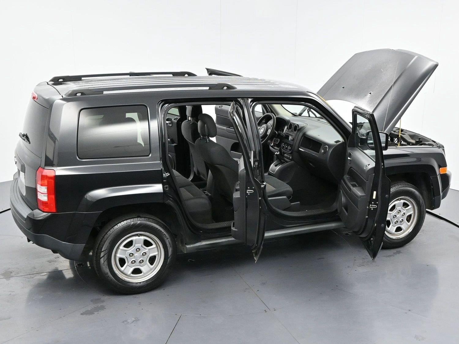 Used 2011 Brilliant Black Crystal Pearl Jeep Sport image 31