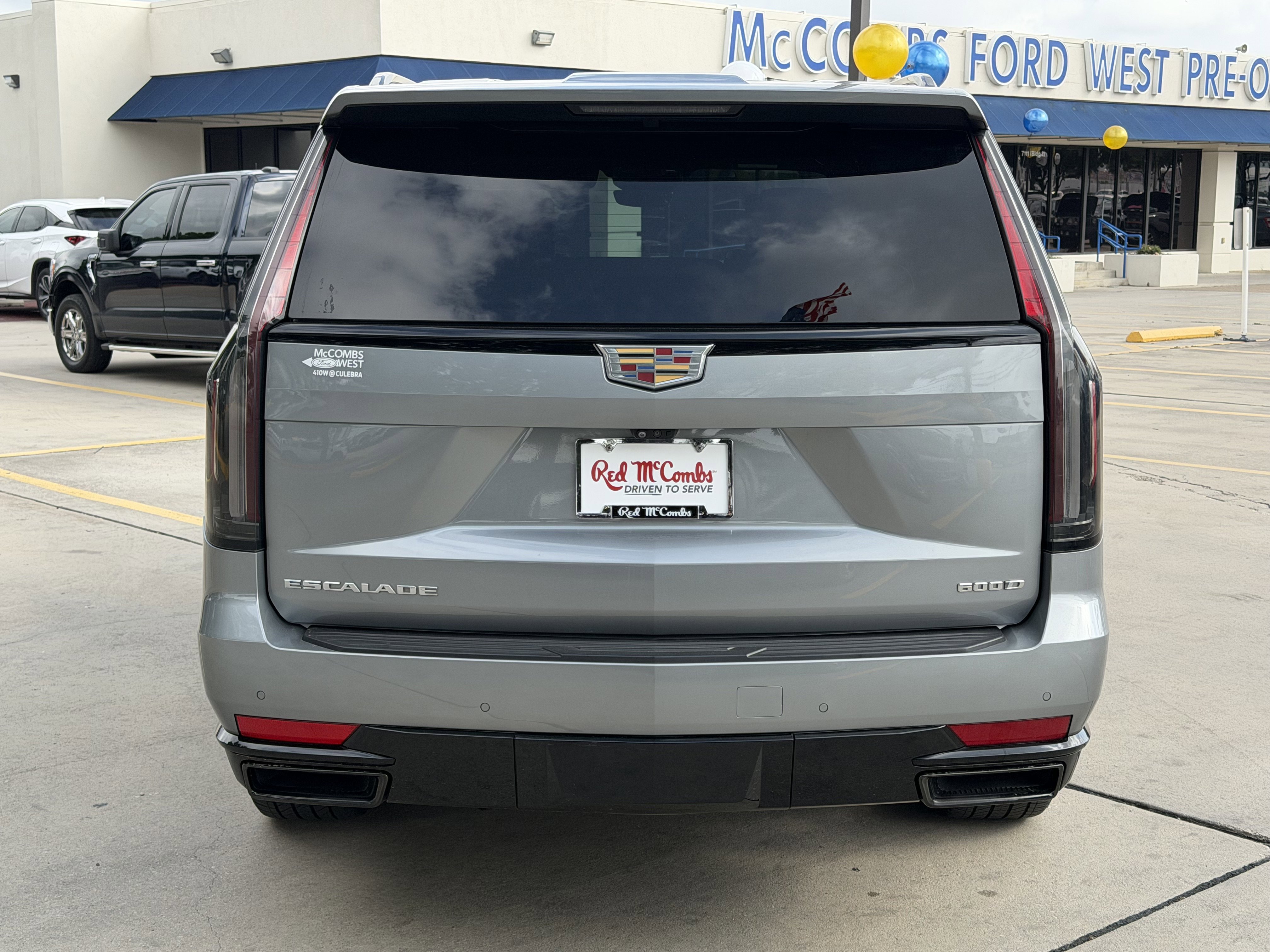 Used 2023 Argent Silver Metallic Cadillac 4WD Sport image 6