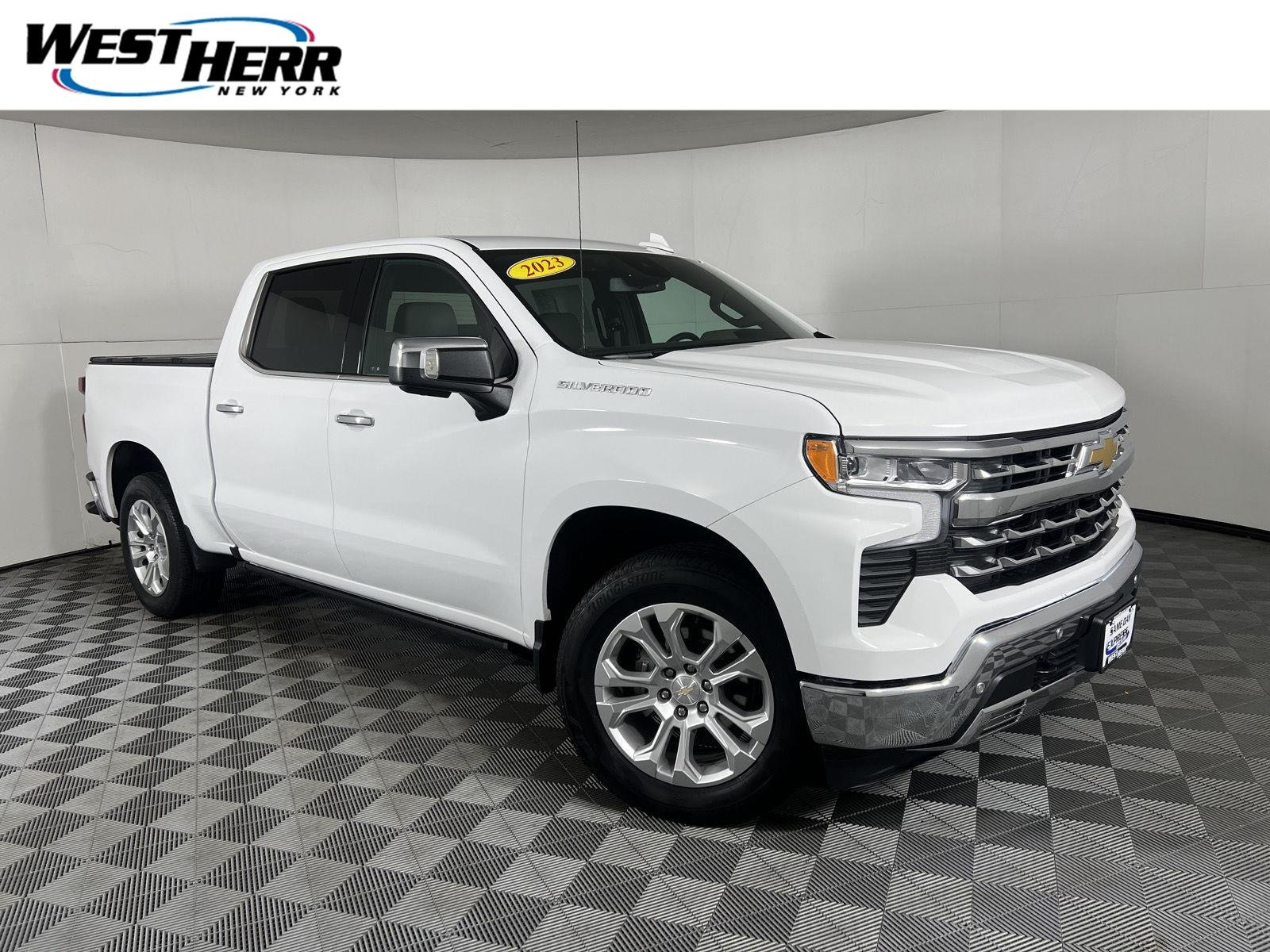 Used 2023 Summit White Chevrolet LTZ image 1
