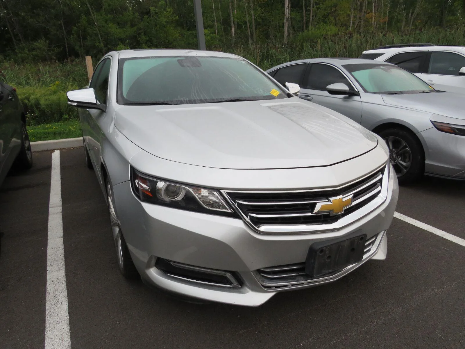 Used 2014 Silver Ice Metallic Chevrolet LTZ image 2