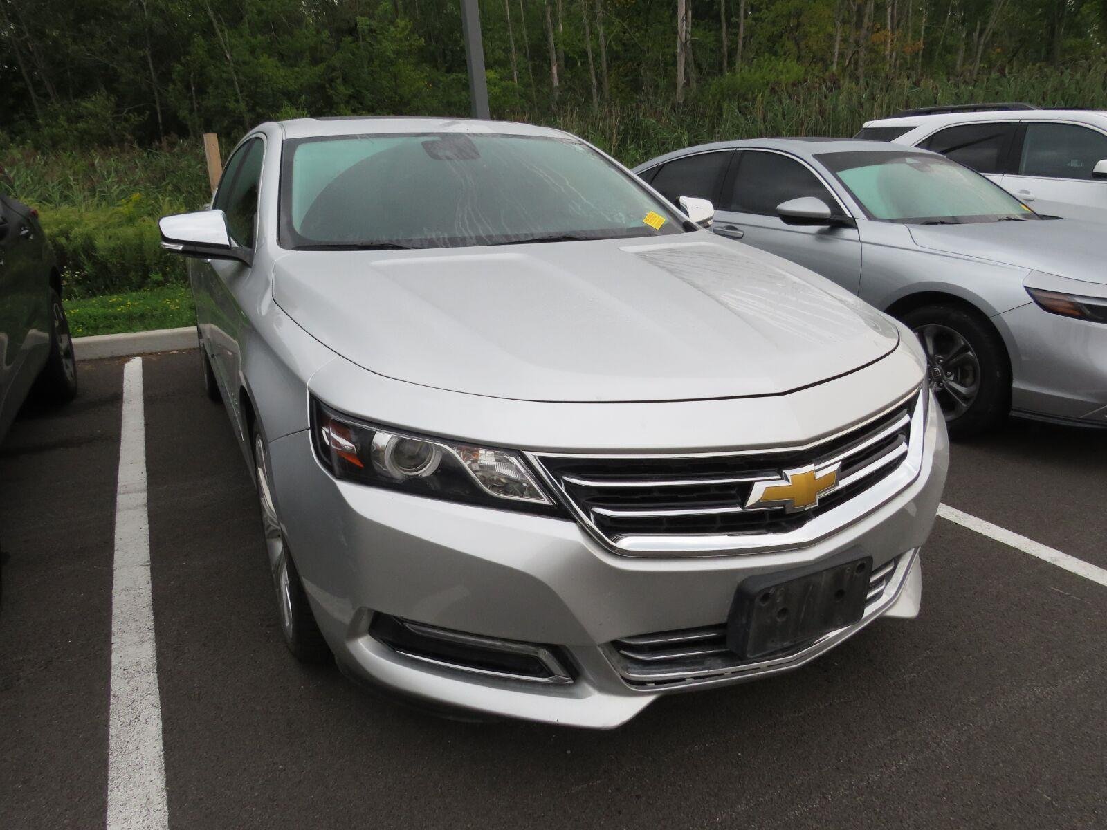 Used 2014 Silver Ice Metallic Chevrolet LTZ image 2