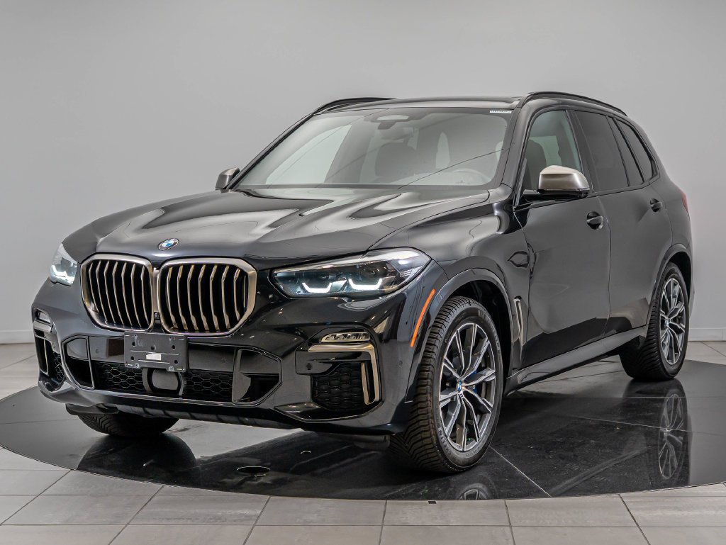Used 2020 Black Sapphire Metallic BMW M50i image 1