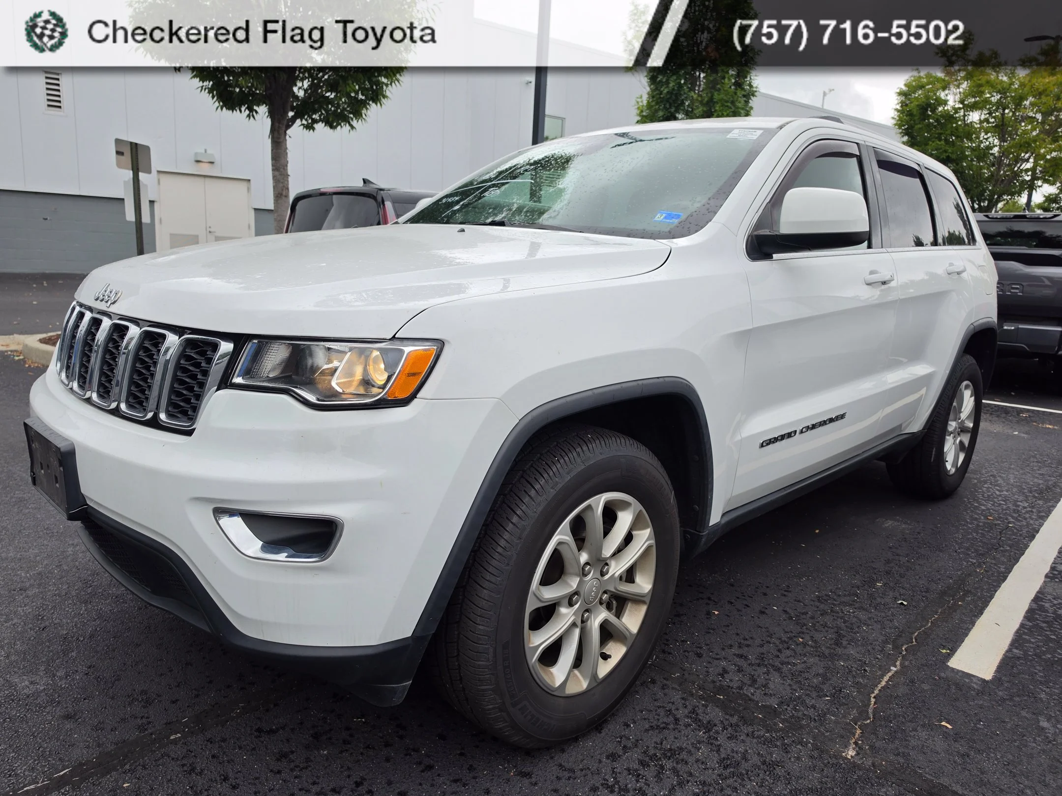 Used 2021 Bright White Clearcoat Jeep Laredo E image 1