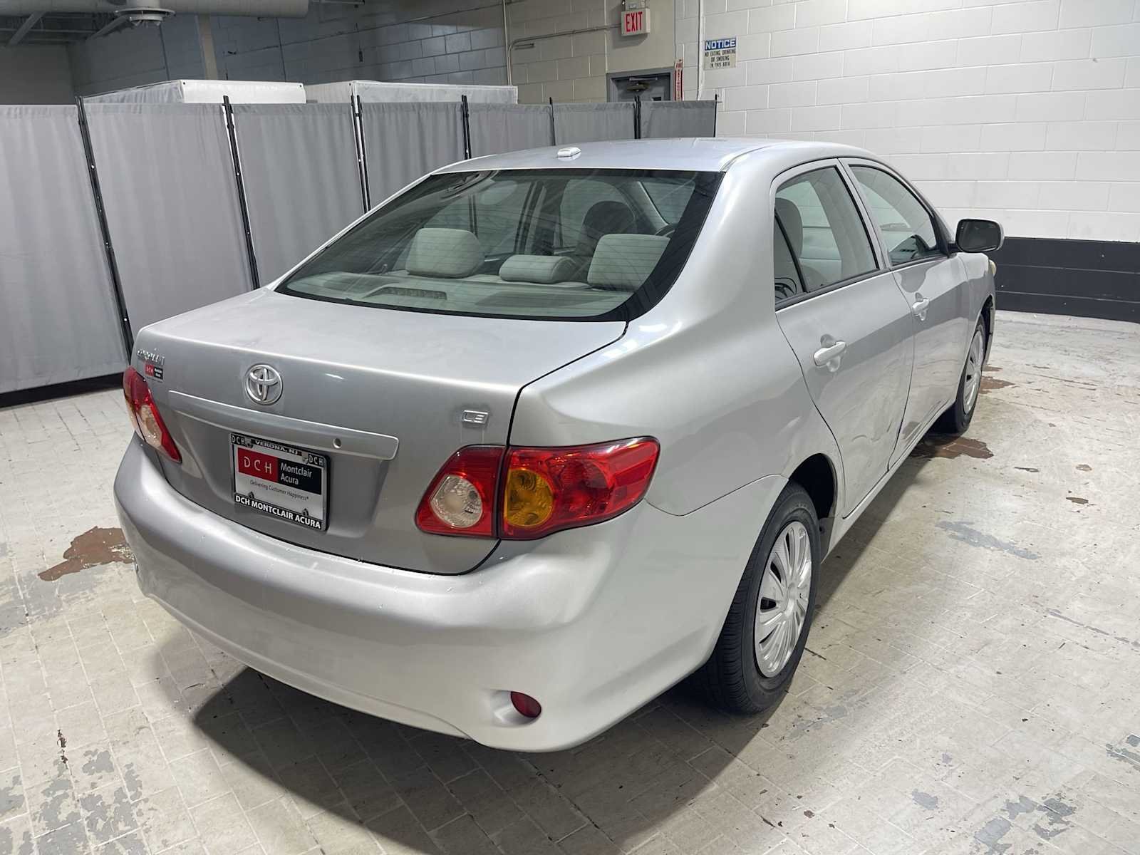 Used 2010 Classic Silver Metallic Toyota LE image 25