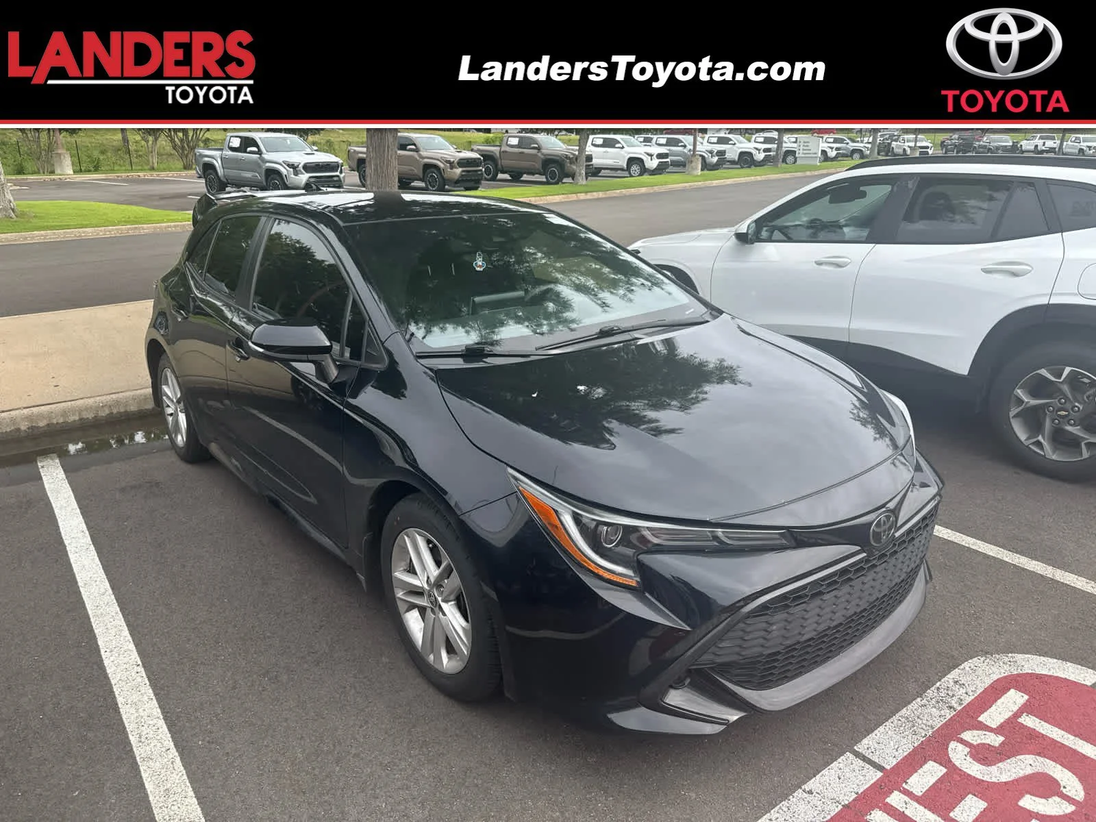 Used 2022 Midnight Black Metallic Toyota SE image 1