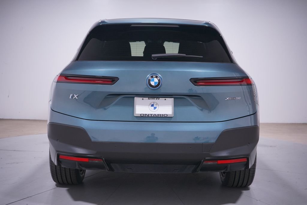 Certified Used 2024 Blue BMW xDrive50 image 5