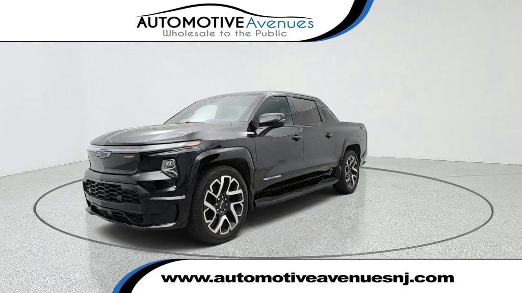 Used 2024 Black Chevrolet e4WD Crew Cab RST image 1
