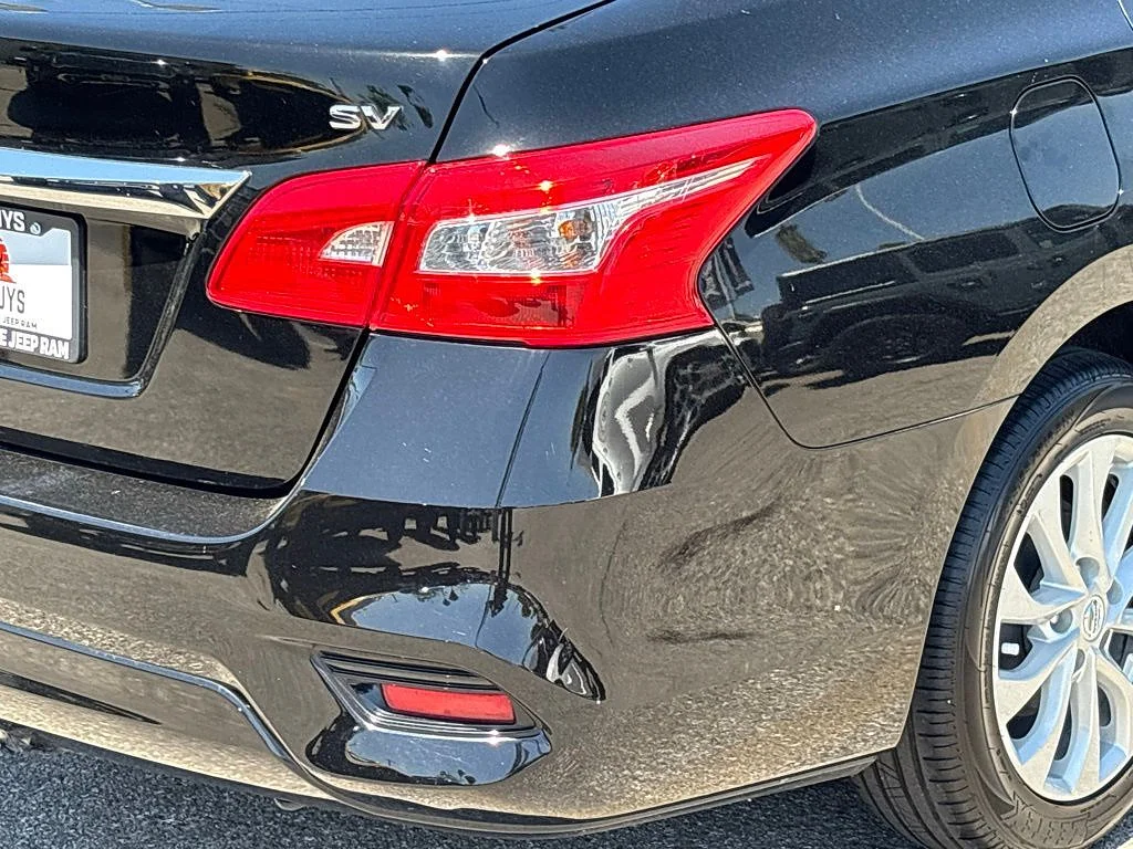 Used 2019 Super Black Nissan SV image 5