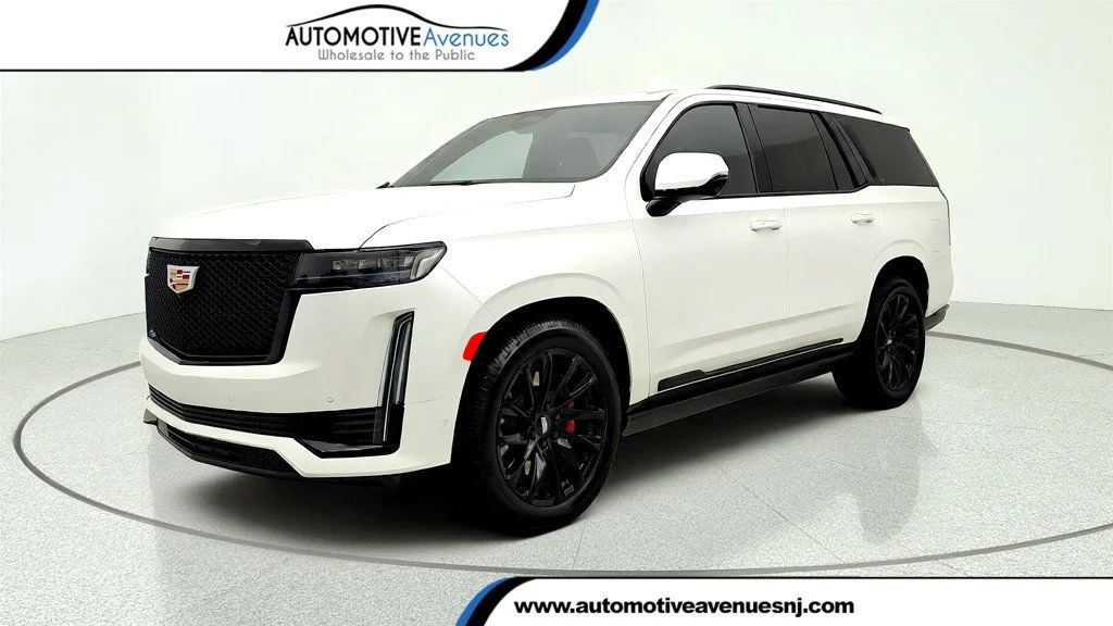Used 2022 Crystal White Tricoat Cadillac Sport 4WD w/ Touring Pkg & Sport Performance Pkg image 1