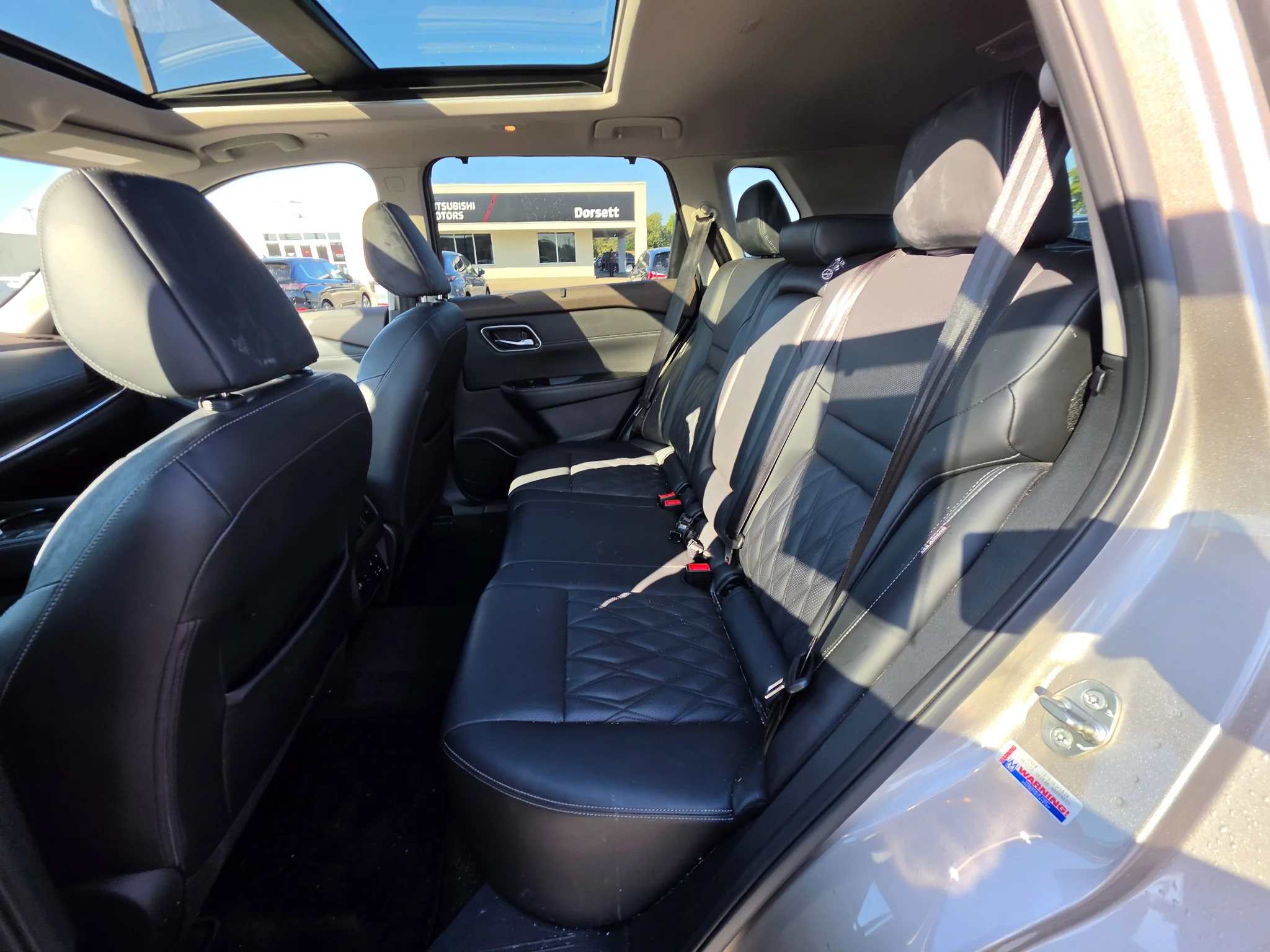 Used 2022 Champagne Silver Metallic/Super Black Nissan Platinum image 14