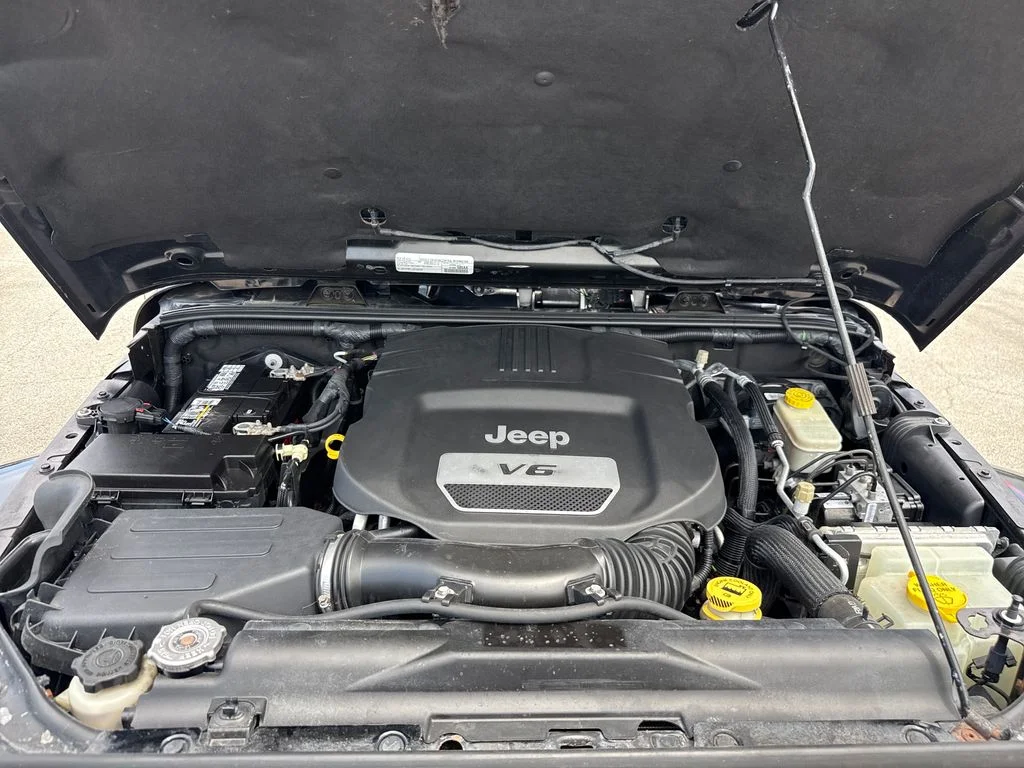 Used 2016 Black Jeep Unlimited Sahara image 24