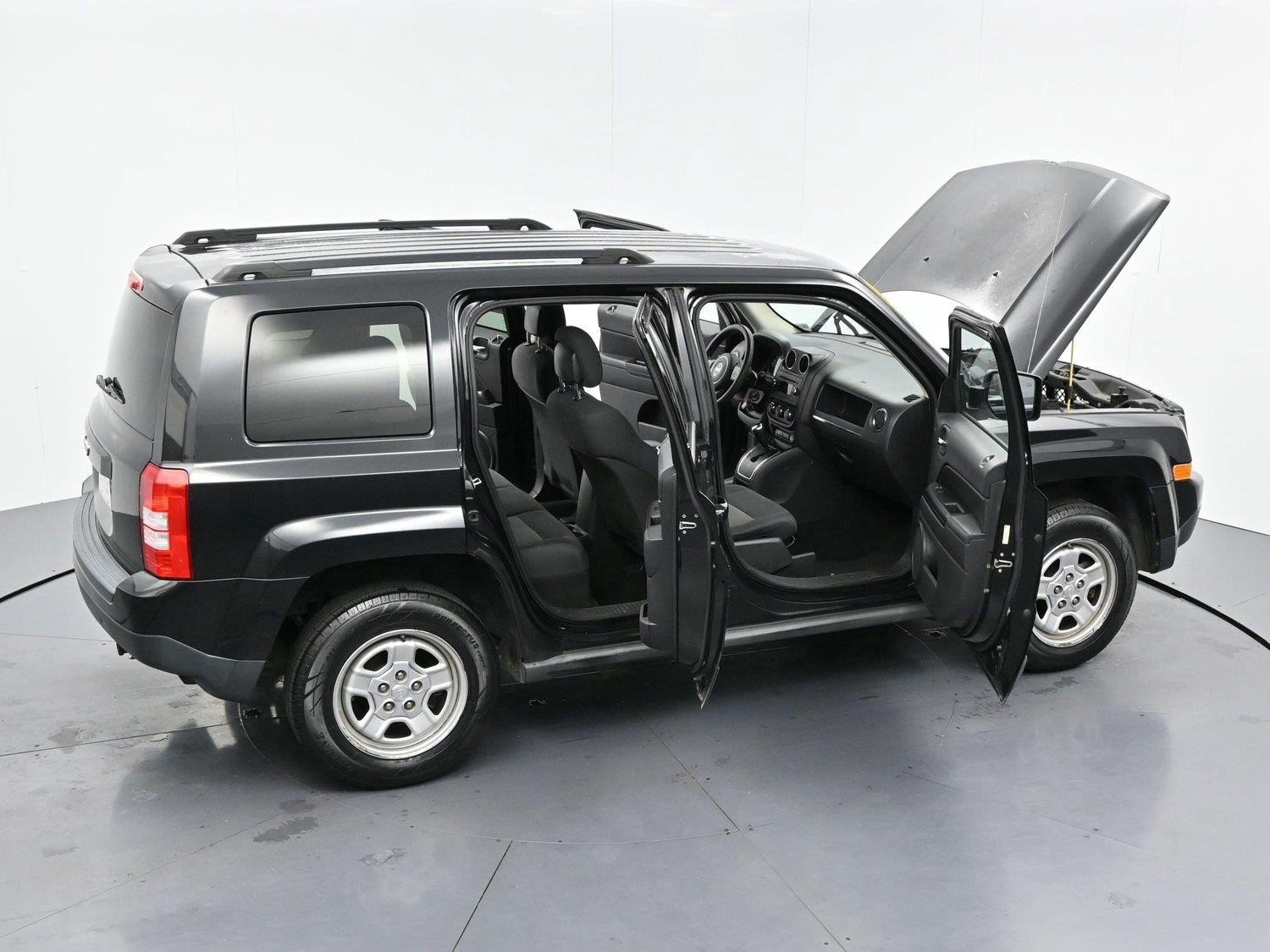 Used 2011 Brilliant Black Crystal Pearl Jeep Sport image 30