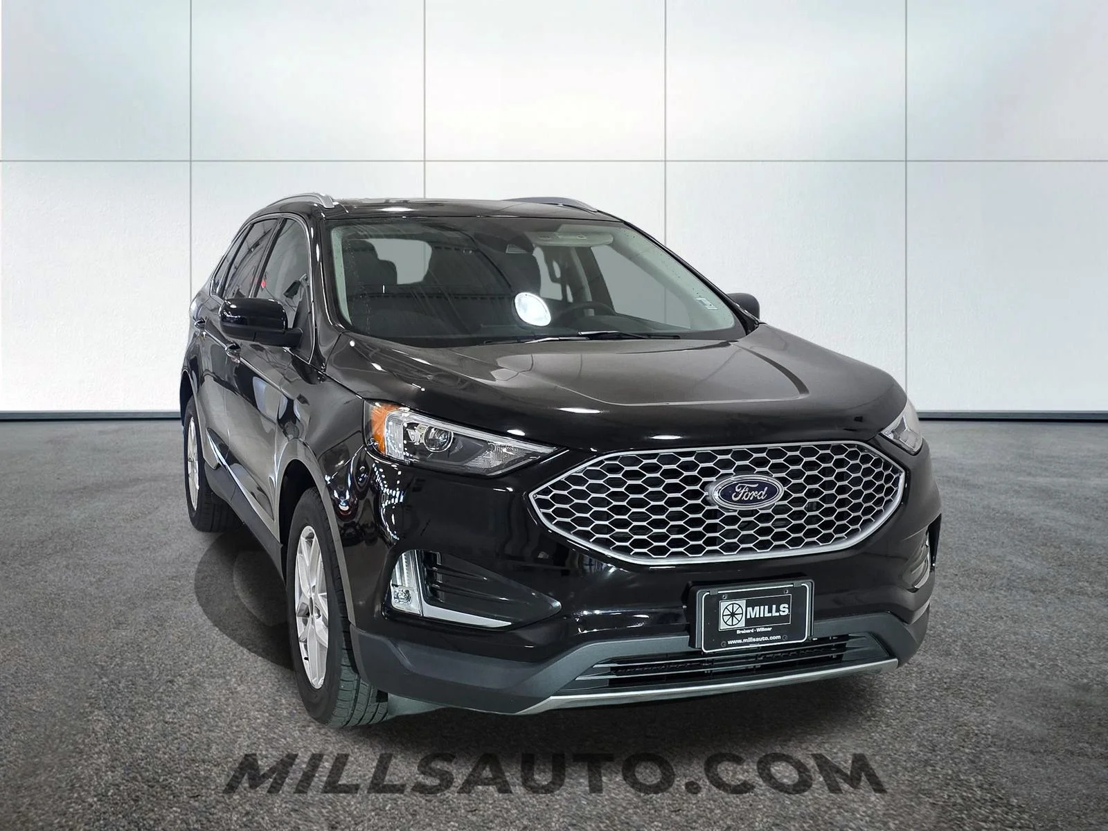 Used 2024 Agate Black Metallic Ford SEL image 11