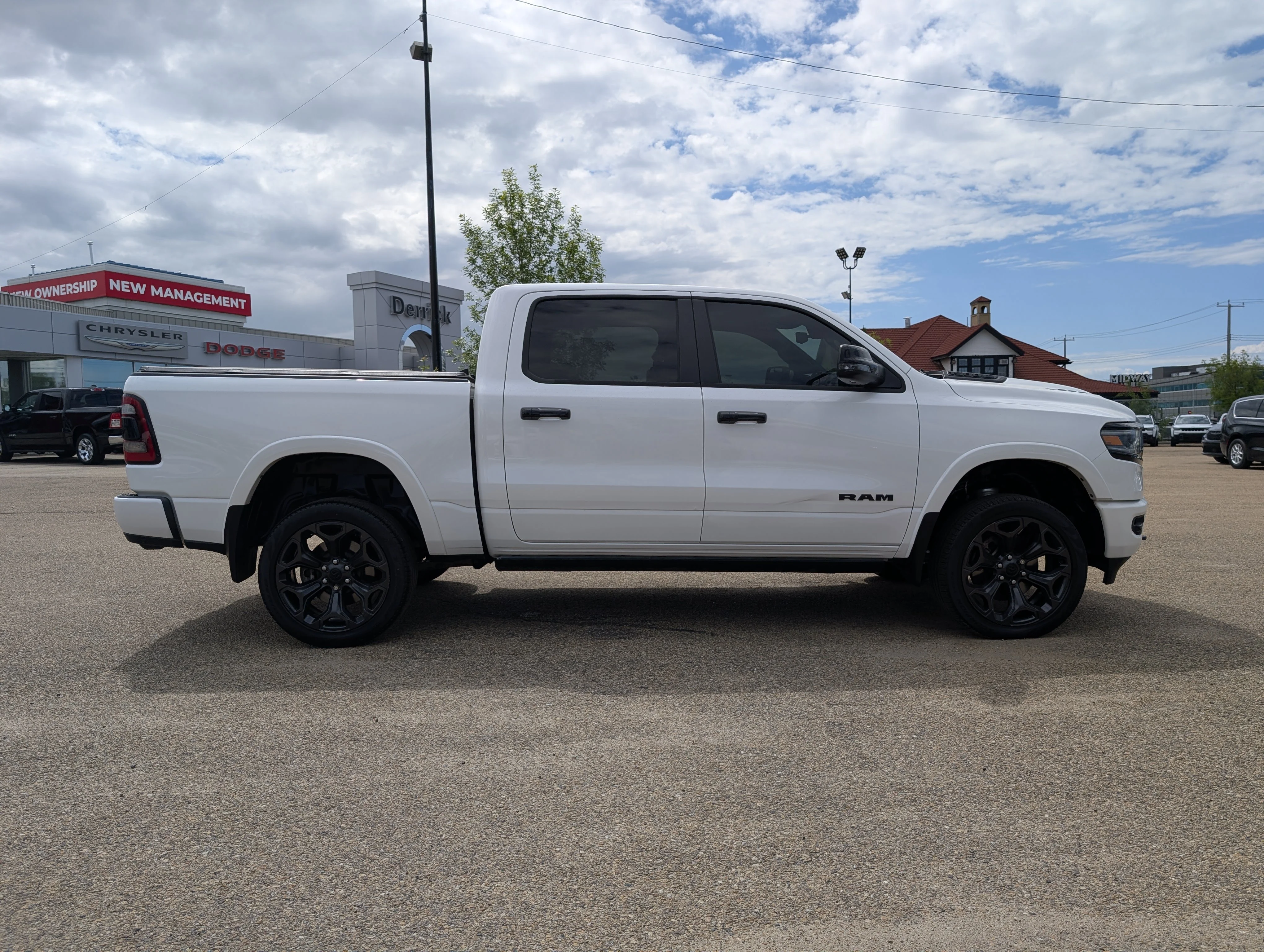 Used 2024 Ivory Tri-Coat Pearl Ram Limited image 8
