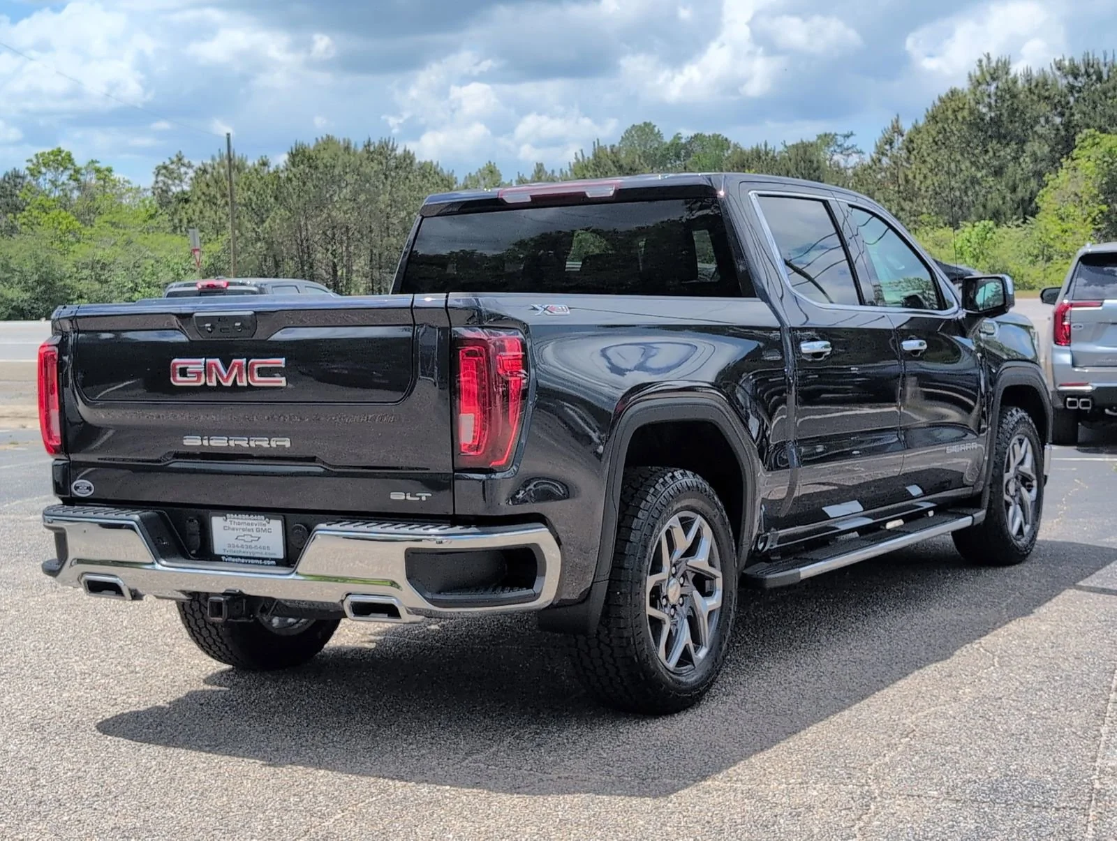 Used 2023 Titanium Rush Metallic GMC SLT image 6