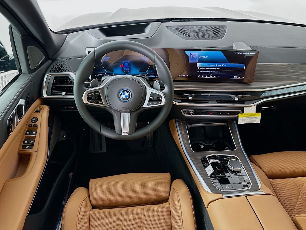 Used 2026 Tanzanite Blue II Metallic BMW xDrive50e image 19