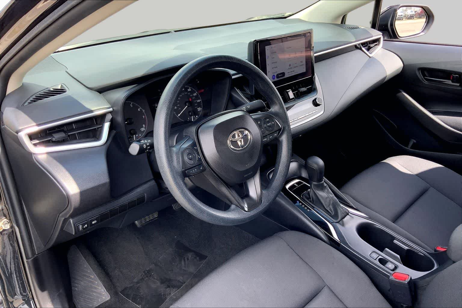 Used 2024 Midnight Black Metallic Toyota LE image 17