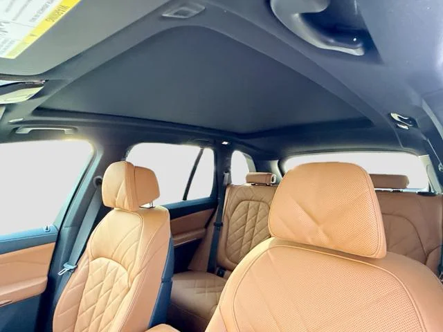 New 2026 Black Sapphire Metallic BMW xDrive50e image 27