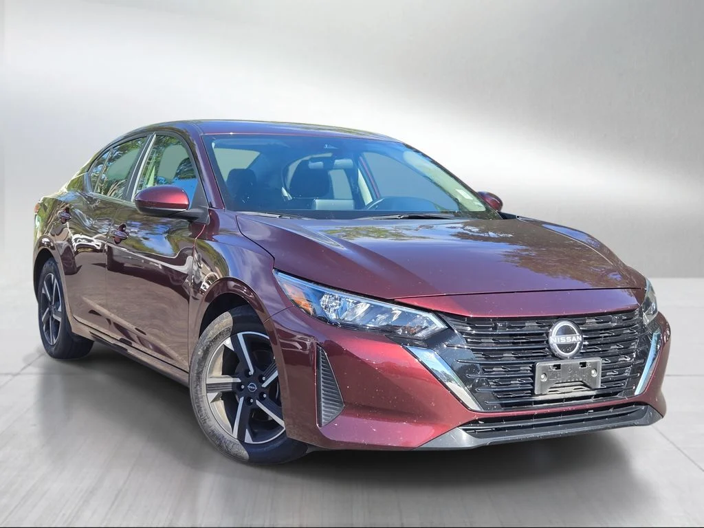 Used 2024 Rosewood Metallic Nissan SV image 1