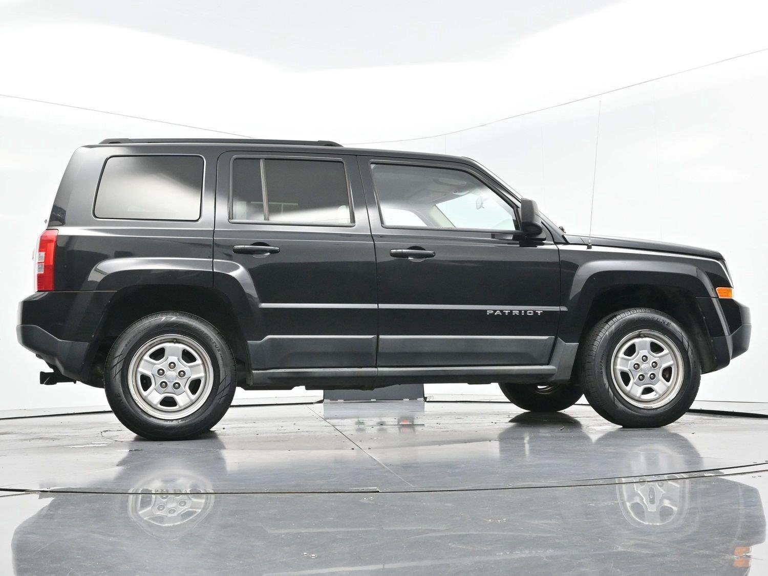 Used 2011 Brilliant Black Crystal Pearl Jeep Sport image 42