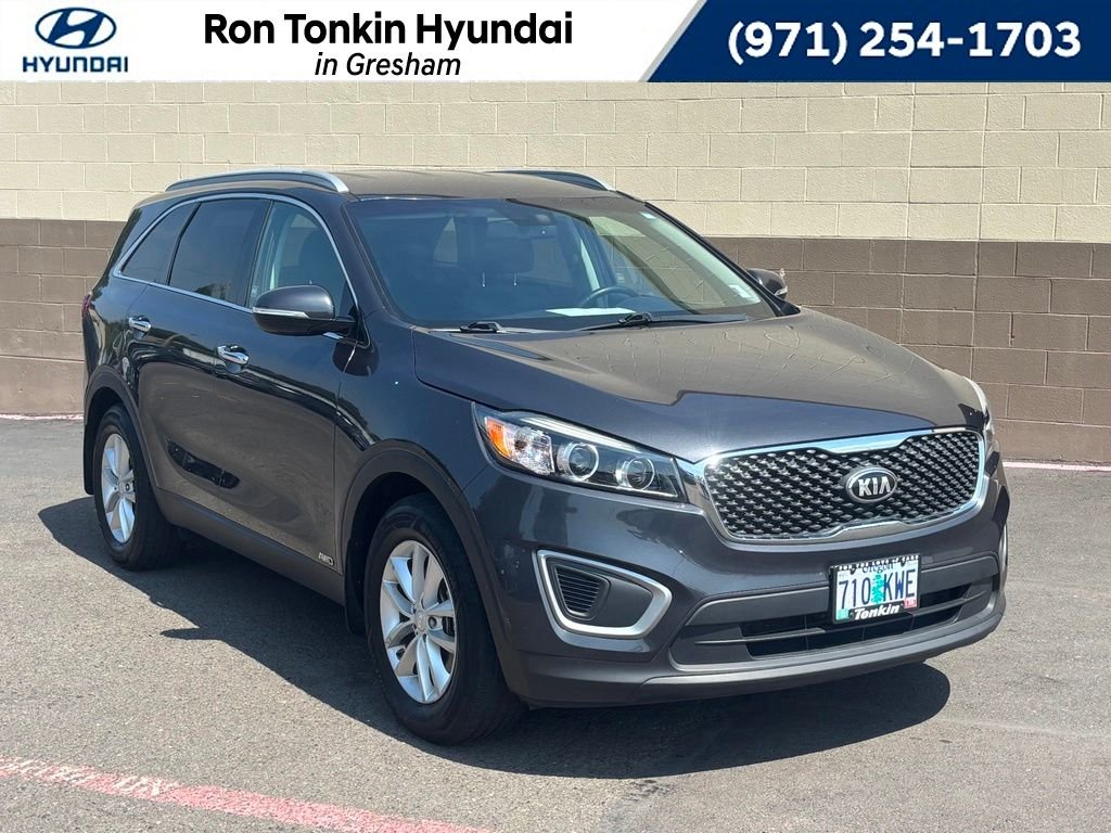 Used 2018 Platinum Graphite Kia LX image 1