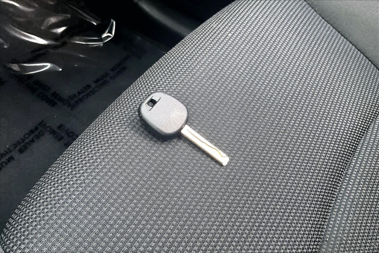 Used 2023 Magnetic Gray Metallic Toyota LE image 14