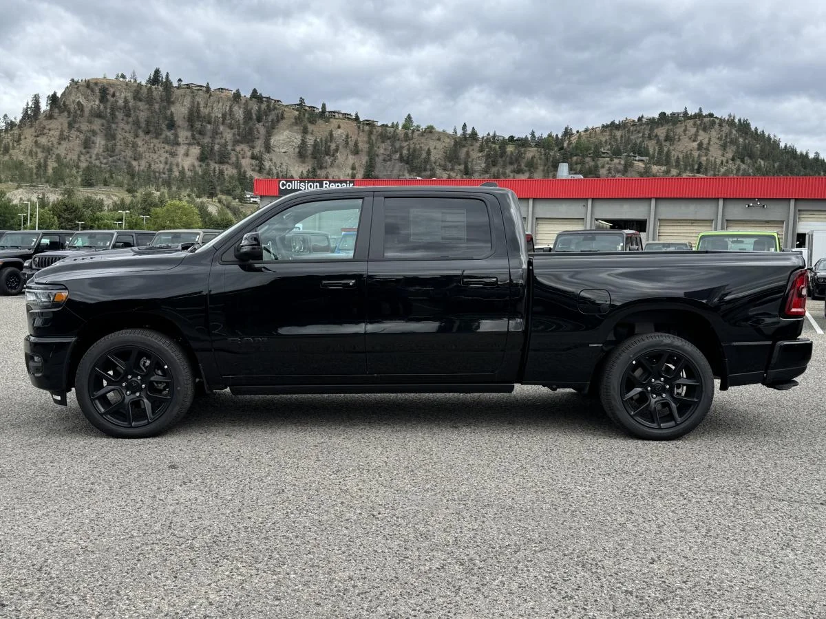 New 2026 Black RAM Sport 4x4 Crew Cab 6