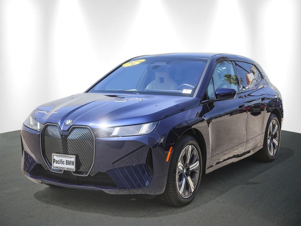 Used 2026 Tanzanite Blue II Metallic BMW xDrive60 image 3