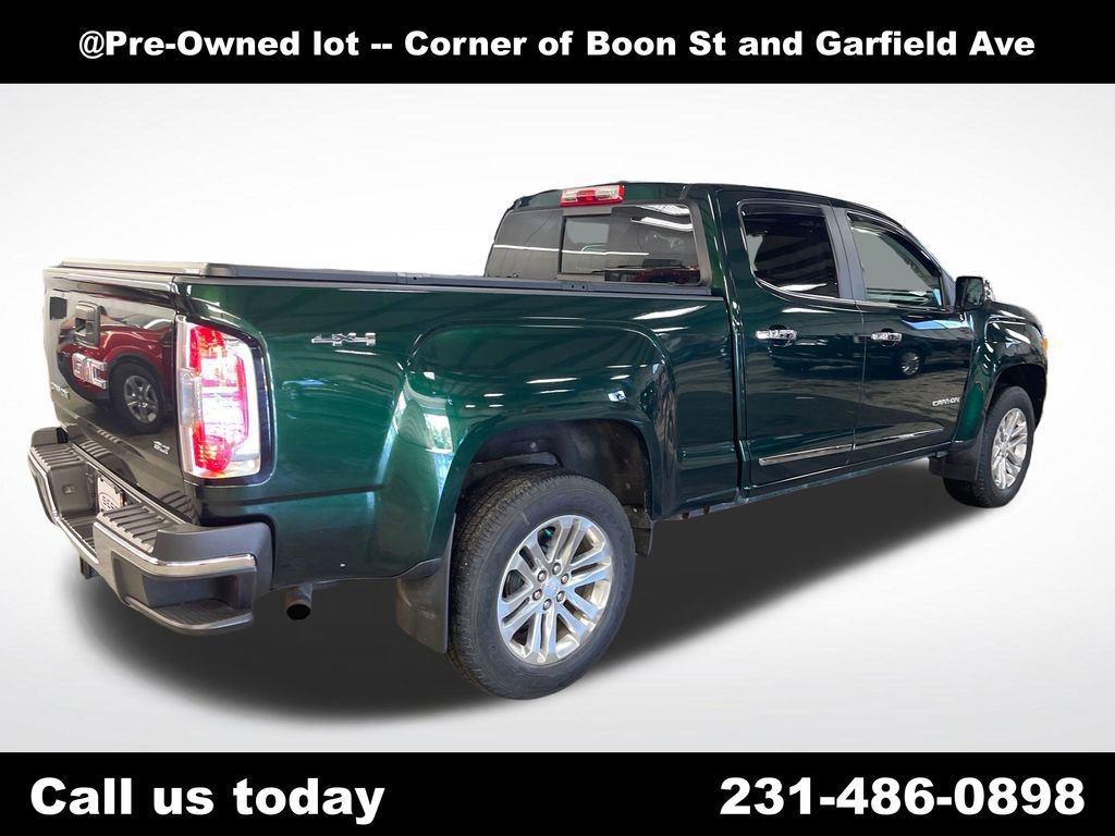 Used 2016 EMERALD GREEN METALLIC GMC 4WD SLT image 5