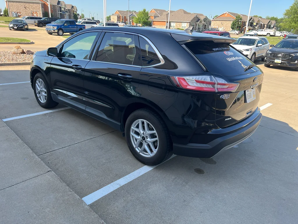 Used 2024 Agate Black Metallic Ford SEL image 6