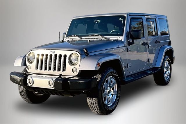 Used 2015 Jeep Wrangler Unlimited Sahara with VIN 1C4HJWEG5FL511851 for sale in Florence, AL