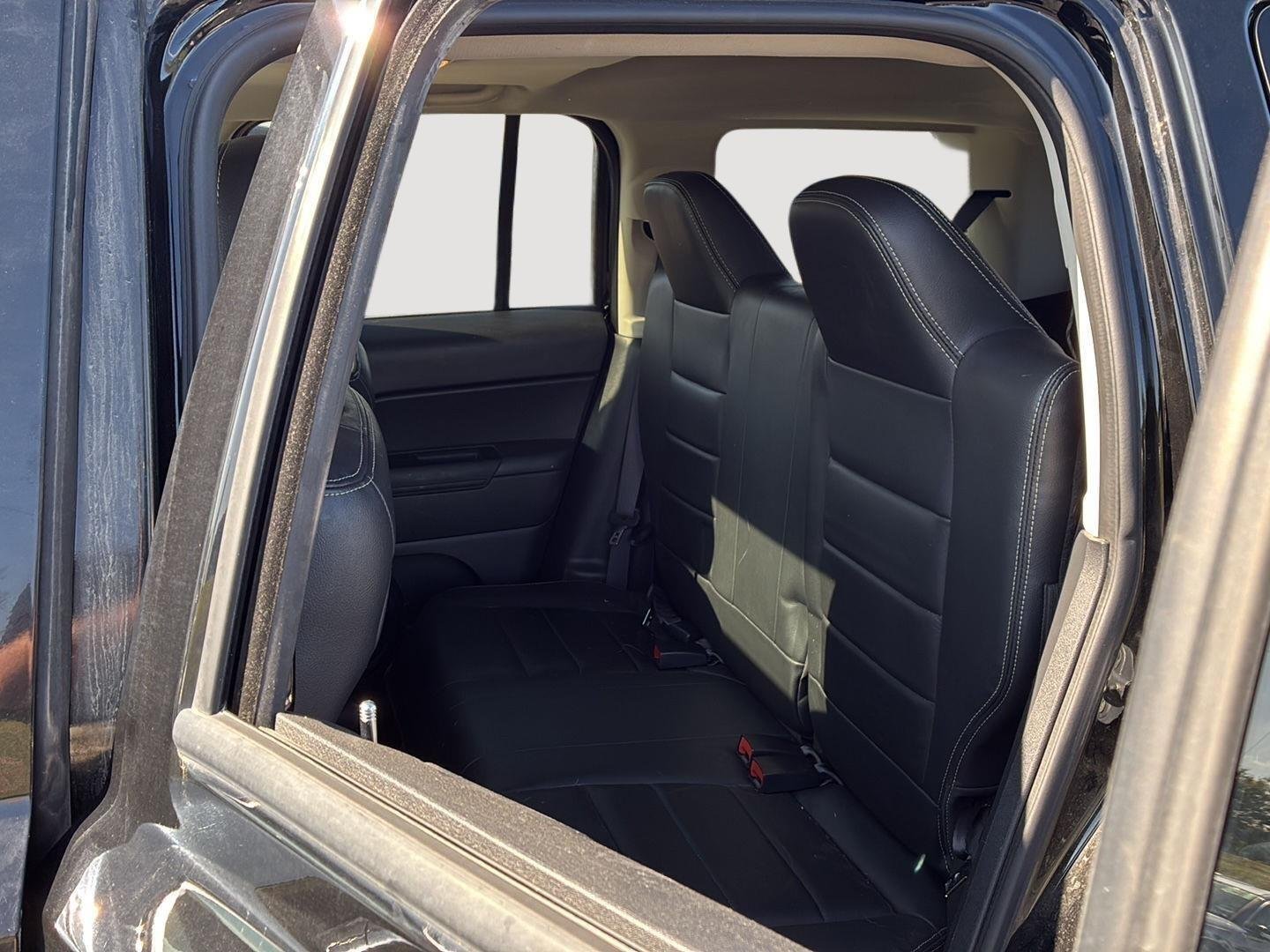 Used 2016 Black Clearcoat Jeep High Altitude Edition image 4