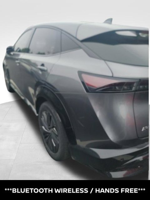 Certified Used 2024 Gray Nissan EVOLVE+ e-4ORCE image 3
