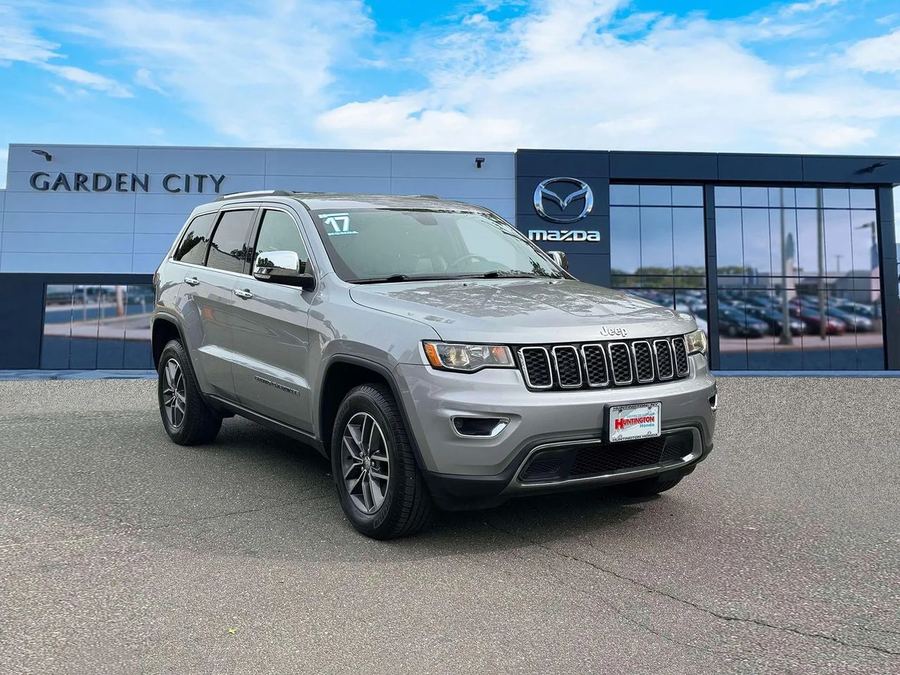 Used 2017 Billet Silver Metallic Clearcoat Jeep Limited 4x4 image 1