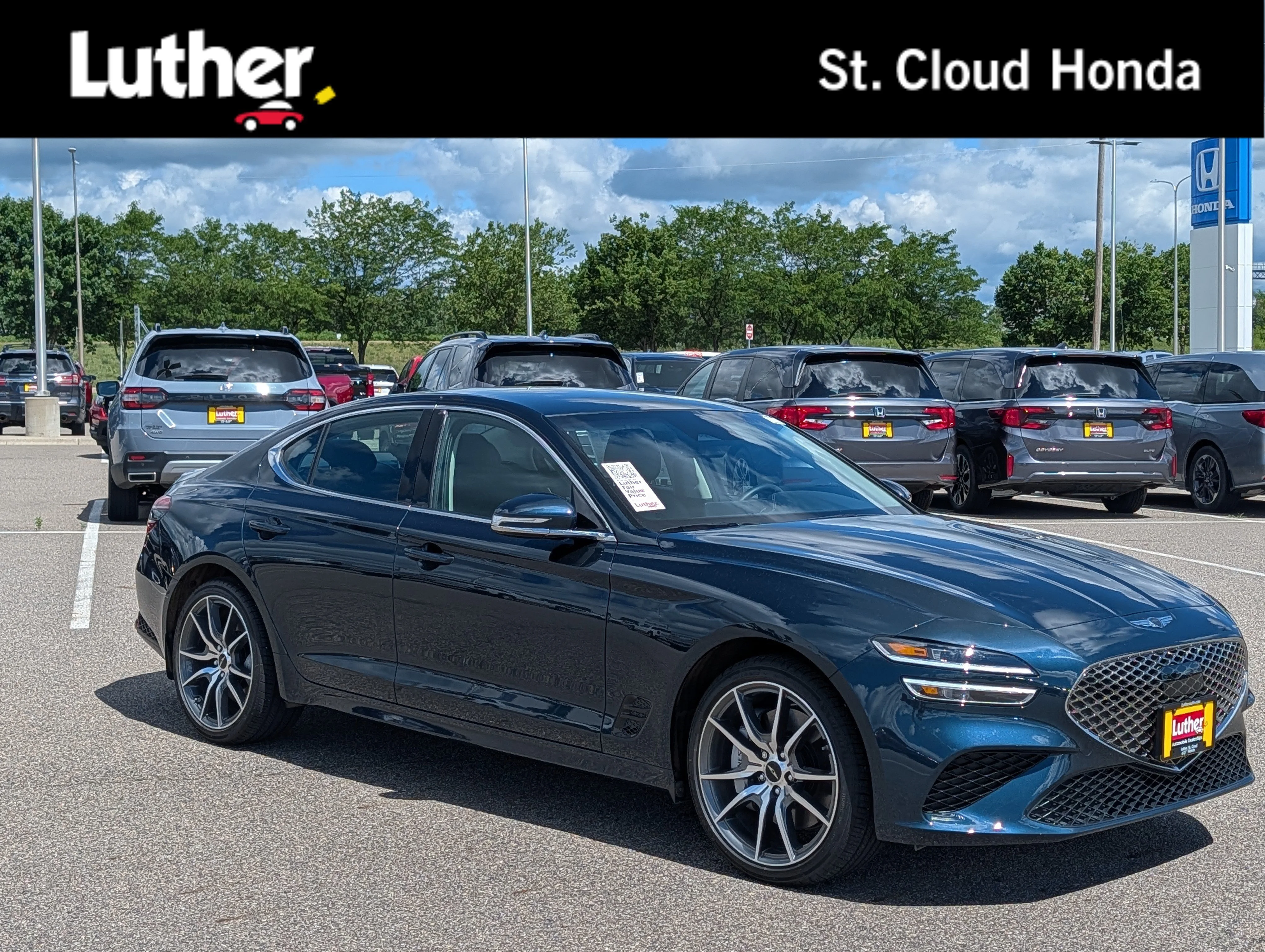 Used 2024 Tasman Blue Genesis 2.5T image 1