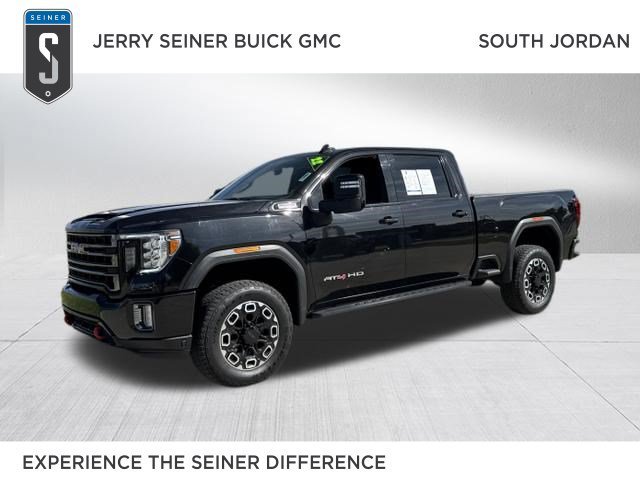 Used 2022 EBONY TWILIGHT METALLIC GMC AT4 image 1