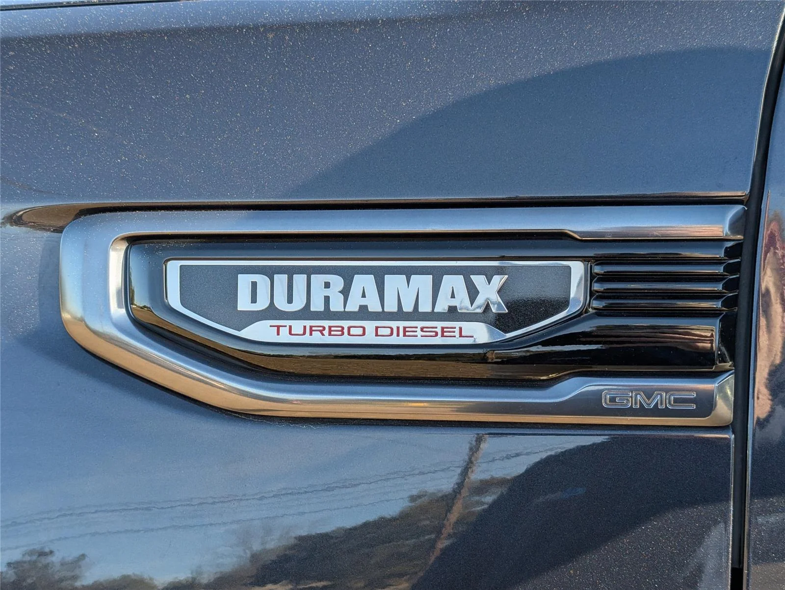Used 2023 Titanium Rush Metallic GMC AT4 image 14