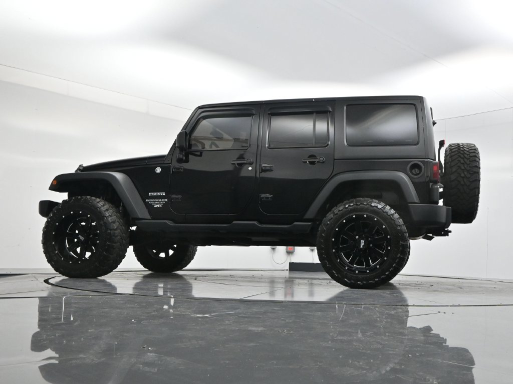 Used 2014 Black Clearcoat Jeep Unlimited Sport image 52