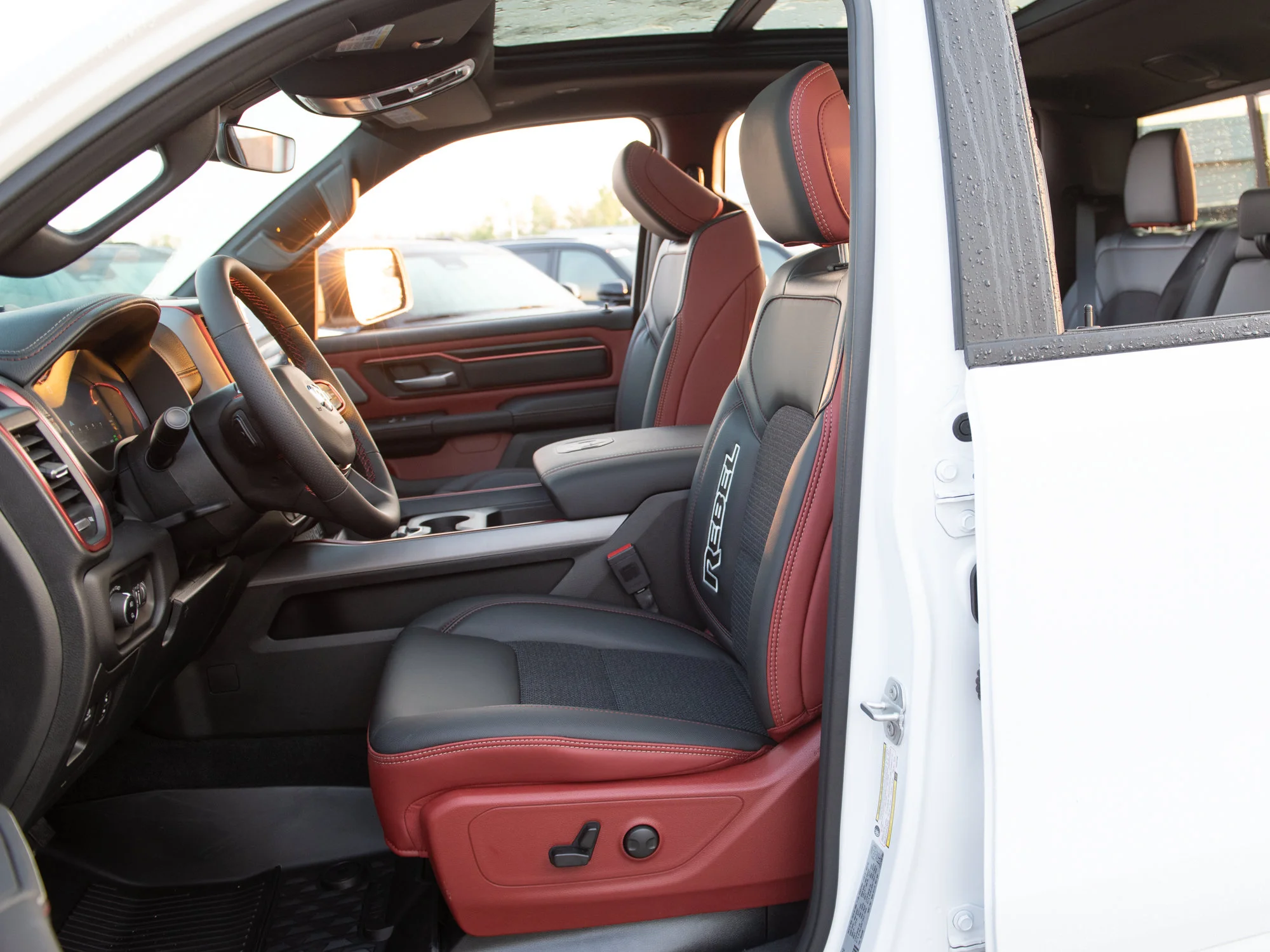 New 2026 White RAM Rebel* Crew Cab 4x4, 33 Inch A/T Tires, Sunroof, Passenger Screen image 25