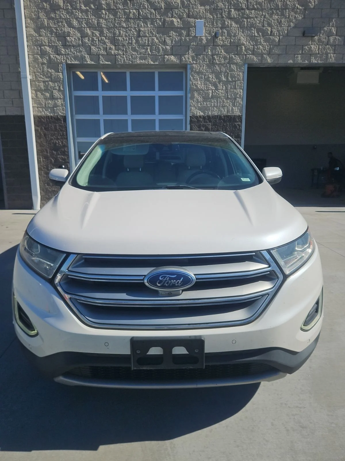 Used 2015 White Platinum Clearcoat Metallic Ford Titanium image 1