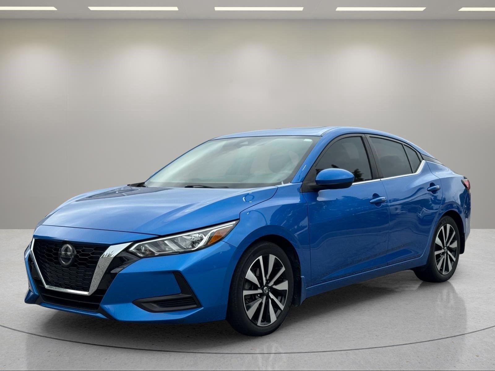 Used 2021 Electric Blue Metallic Nissan SV image 1