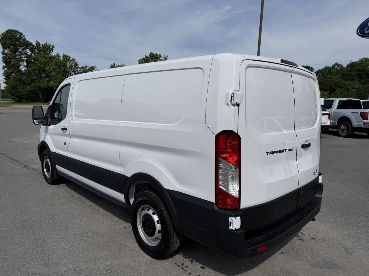 New 2026 White Ford 150 3dr LWB Low Roof Cargo Van image 20