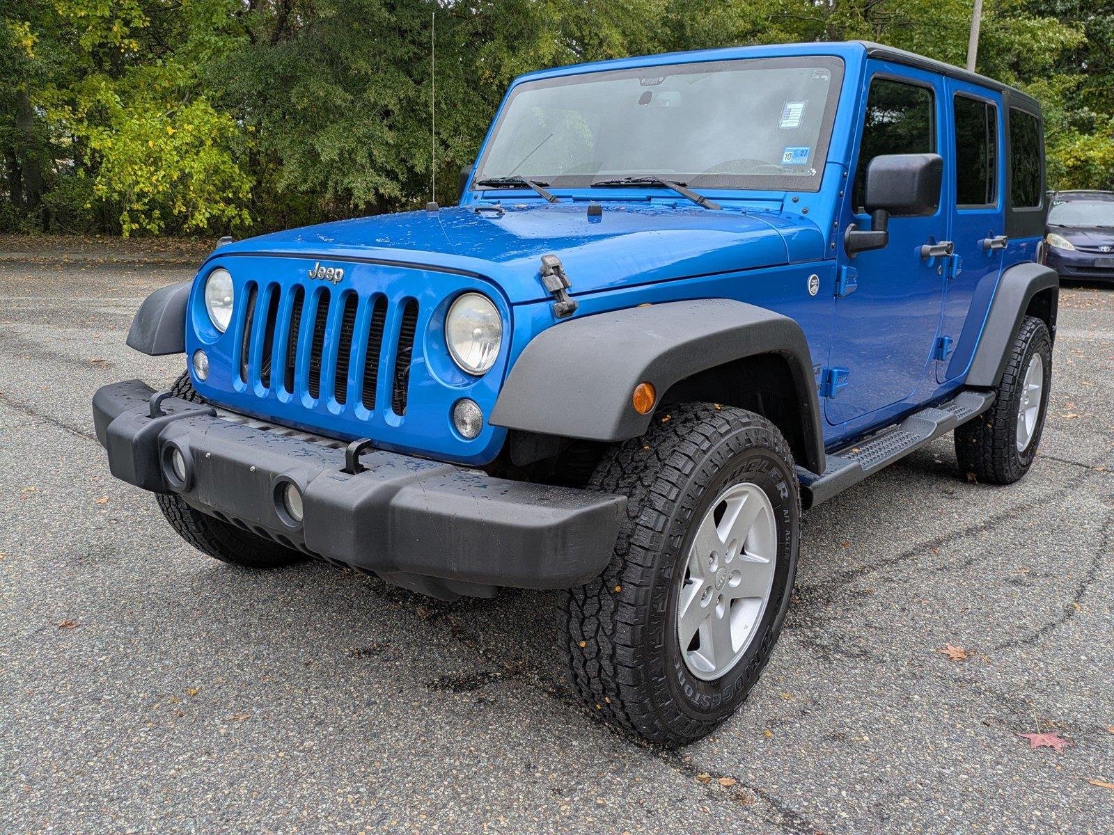 Used 2015 Hydro Blue Pearl Coat Jeep Sport image 8