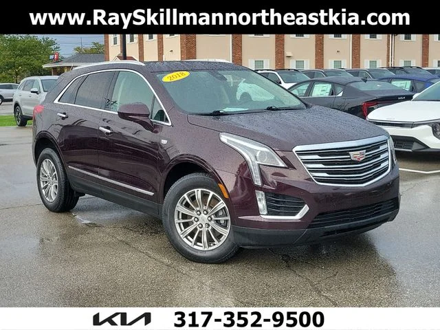 Used 2018 Red Cadillac Luxury image 1