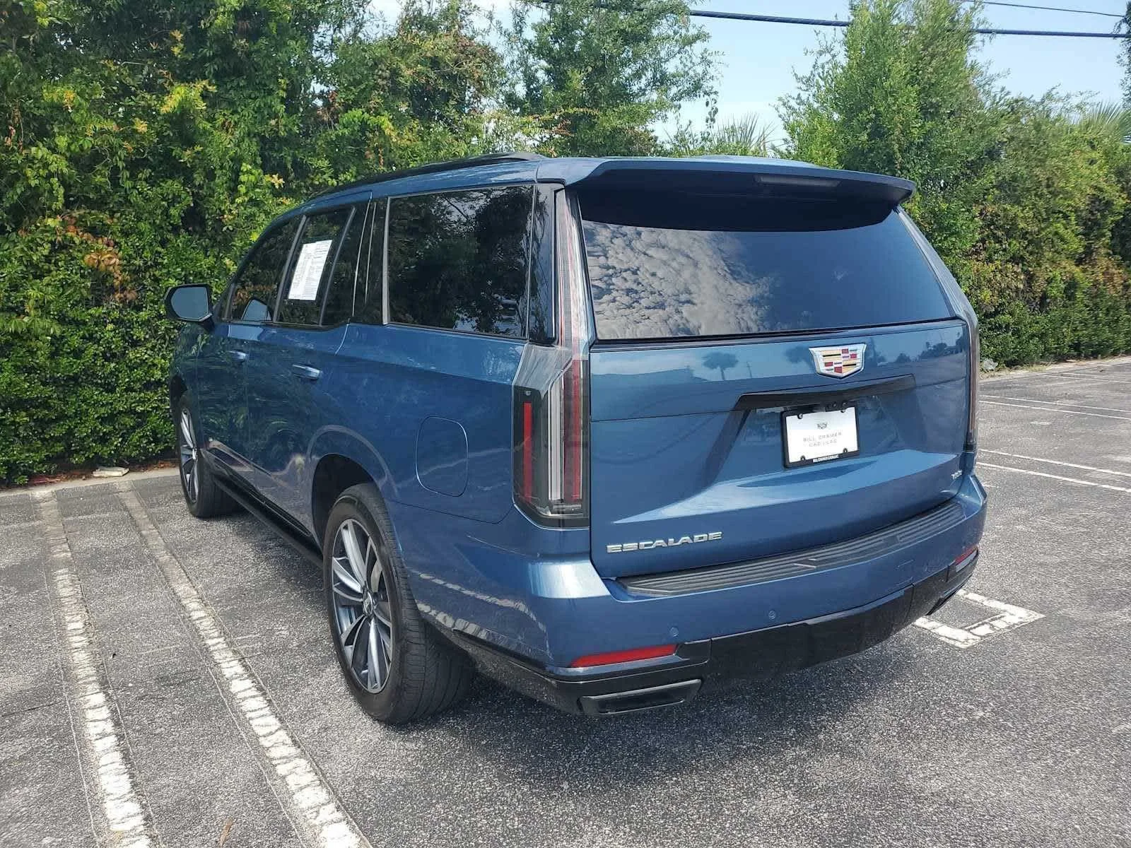 Used 2025 Deep Sea Metallic Cadillac Sport image 3