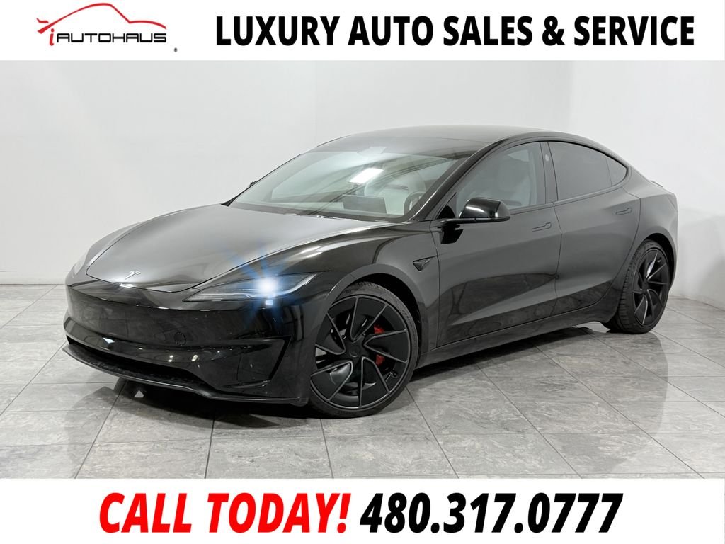 Used 2024 Black Tesla Performance image 1