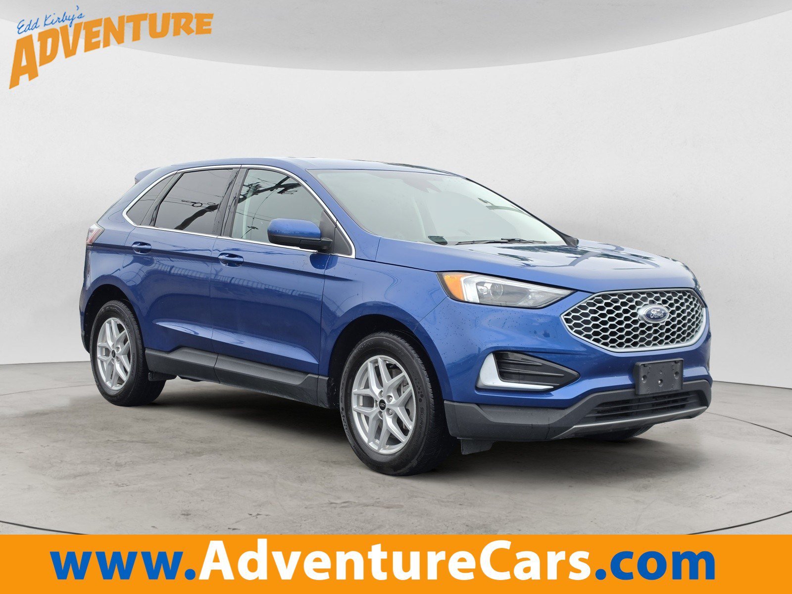 Used 2024 Blue Metallic Ford SEL image 1