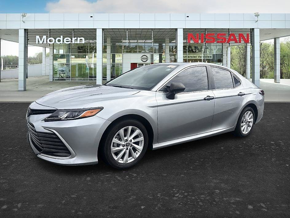 Used 2024 Celestial Silver Metallic Toyota LE image 1