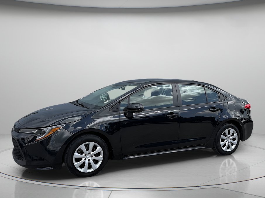 Used 2022 Black Sand Pearl Toyota LE image 1